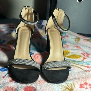 has diamonds on ankle and front feet strap